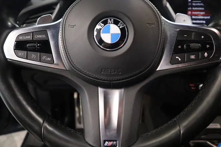 BMW 1-serie M135i xDrive High Executive Edition 306PK Headup Display Sportuitlaat Navigatie PDC VCP Cruise Control 19LMV  Volleder interieur Schaal stoelen 2 Jaar garantie mogelijk* ( vraag naar de voorwaarde) afbeelding 11