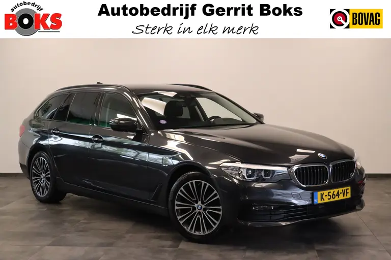 BMW 5 Serie Touring 520i High Executive Navigatie CruiseControl 18LMV Stoel / Stuur verwarming el trekhaak afbeelding 1