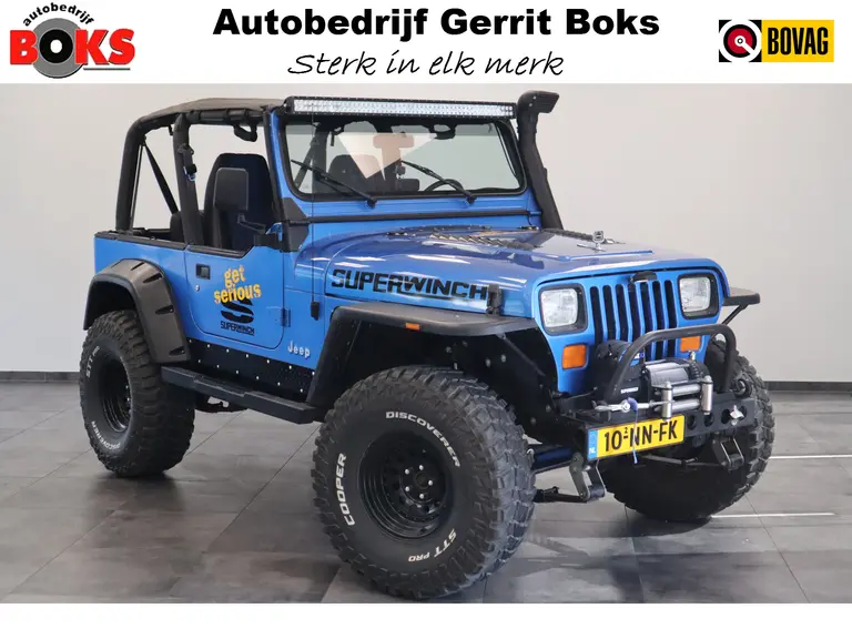 Jeep Wrangler 4.0i Softtop 4WD Luxe Leder Automaat Uniek LED Bar Compressor Winch Lier Grote banden 80372KM afbeelding 1