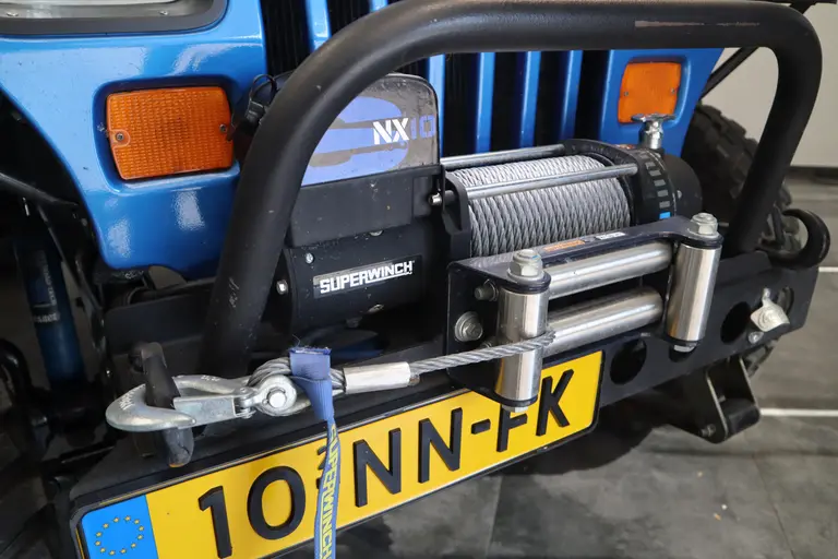 Jeep Wrangler 4.0i Softtop 4WD Luxe Leder Automaat Uniek LED Bar Compressor Winch Lier Grote banden 80372KM afbeelding 4