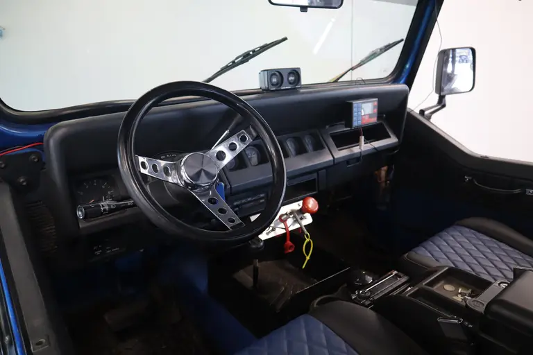 Jeep Wrangler 4.0i Softtop 4WD Luxe Leder Automaat Uniek LED Bar Compressor Winch Lier Grote banden 80372KM afbeelding 5