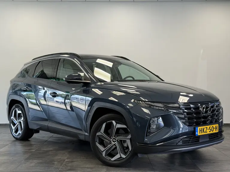 Hyundai Tucson 1.6 T-GDI PHEV Premium Sky 4WD Panoramadak Navigatie Full-led 24 maanden garantie mogelijk (*vraag naar de voorwaarden) afbeelding 1