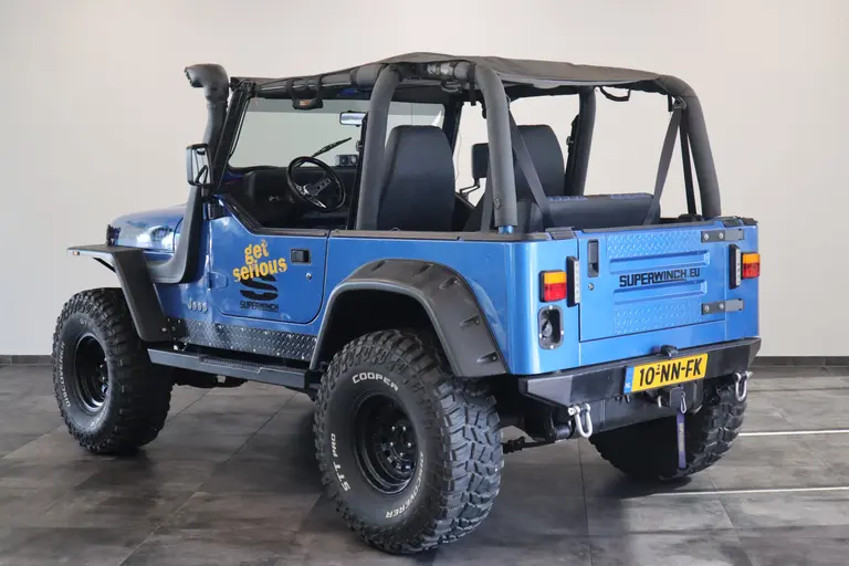 Jeep Wrangler 4.0i Softtop 4WD Luxe Leder Automaat Uniek LED Bar Compressor Winch Lier Grote banden 80372KM afbeelding 3